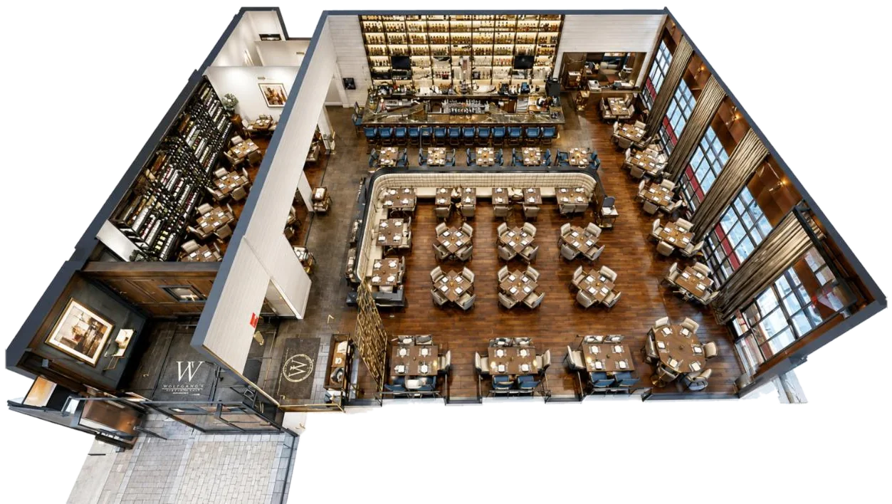 Overhead dollhouse of a restaurant dining room and bar
