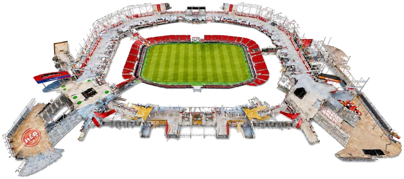 Matterport dollhouse of a soccer stadium showing the pitch, seating bowl and concourses